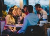 Guests enjoying the plated dinner and drinks at the Boston Dinner Cruise in Boston, MA