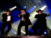 Texas Tenors singing on stage.