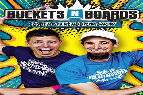 Matthew and Gareth of Buckets N Boards: Comedy Percussion Show, wearing blue and purple shirts adorned with the Bucket N Boards logo.