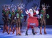 Christmas Town ice show with Santa and reindeer performers on stage.