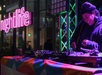 The DJ at Nightlife - California Academy of Sciences cheerfully plays the beat to hype the crowd.