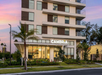 Beautifully landscaped hotel exterior.
