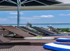 Poolside sun loungers.