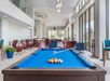 Grab a cue and play a game of billiards with your friends.