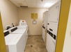 Guest laundry equipped with washers and dryers.