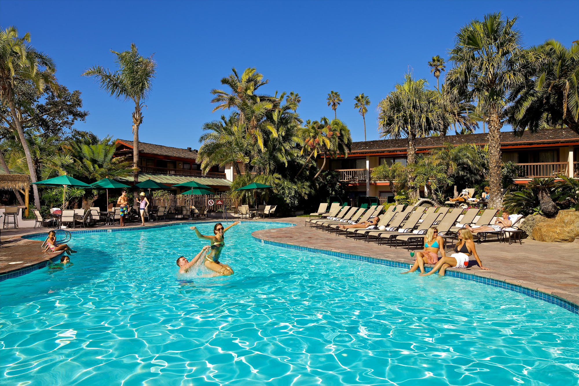 Refreshing outdoor pool with sun loungers.