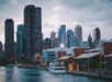 View of the city of Chicago on an overcast day from the deck of the Chicago Premier Dinner Cruise on Lake Michigan.