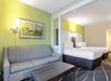 With two queen beds and a sofa bed, this room is perfect for a restful and flexible stay.
