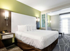 The room features a king bed and a sofa bed, offering both comfort and flexibility for your stay.