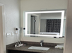 Freshen up in style with perfect lighting and a hairdryer.