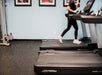 A guest working out in the fitness room.