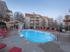 Take a refreshing dip in the outdoor pool, the perfect spot to unwind and relax.