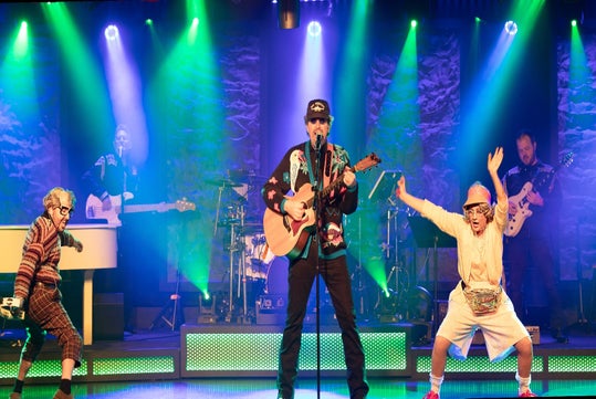 The Jamboree Singers and the award-winning Grand Band on the Comedy Jamboree stage in Branson.