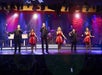 The Jamboree Singers, Tracy Heaston, and the award-winning Grand Band performing on stage.