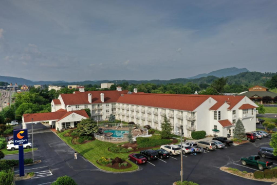 Exterior view of the hotel showcasing its inviting architecture and surrounding area.