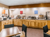 Breakfast area with various breakfast items.