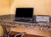 Business center with a desktop computer and a printer.
