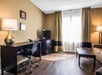 Work desk, flat-screen TV, coffee/tea machine at Comfort Inn & Suites near Six Flags, GA.