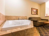 Whirlpool tub in some rooms at Comfort Inn & Suites, Valdosta, GA.