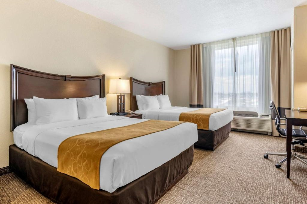 Guest room with two queen beds.