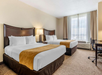 Guest room with two queen beds.