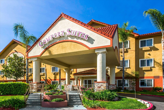 Beautifully landscaped hotel exterior.