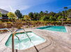 Refreshing outdoor pool and hot tub.