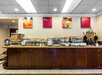 Breakfast with cereals and pastries selection.
