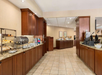 Breakfast Area at Country Inn & Suites by Radisson, Atlanta Galleria Ballpark, GA.