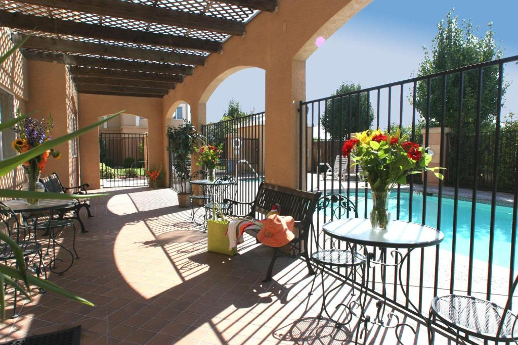 Take a refreshing swim at the outdoor pool or unwind at the poolside patio.
