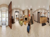 Panoramic view of a hotel lobby with a reception desk, seating area, fireplace, and wooden accents, featuring tile flooring and bright lighting.