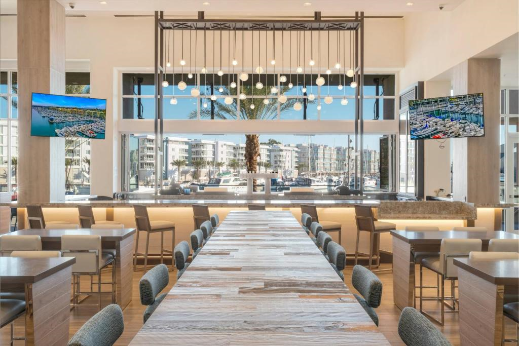 Dine in style at the hotel restaurant with marina views.