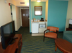 Living area, flat-screen TV, mini-refrigerator, microwave at Courtyard by Marriott Key West Waterfront, FL.