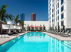 Take a dip in the outdoor pool, bask in the sun on the sun loungers, or simply chill at the shaded cabanas.