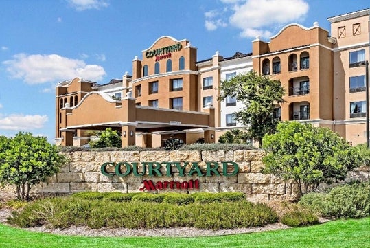 The front exterior of the Courtyard by Marriott San Antonio SeaWorld®/Westover Hills on a sunny day in San Antonio, Texas.
