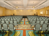 Meeting facility with carpeted floors and ample seating.