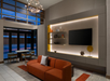 Modern living room with an orange sofa, wall-mounted TV, shelves with decor, and a dining table near large windows.