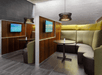 Dining area with comfortable couch and TV.