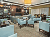 Lobby / Reception with plenty of seating area, TV, and reading materials.