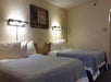 Two queen beds in a guest room.