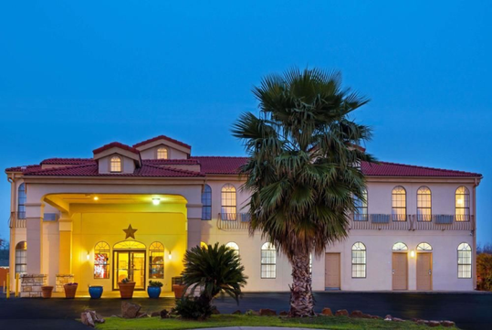 Beautifully landscaped entrance to the hotel.