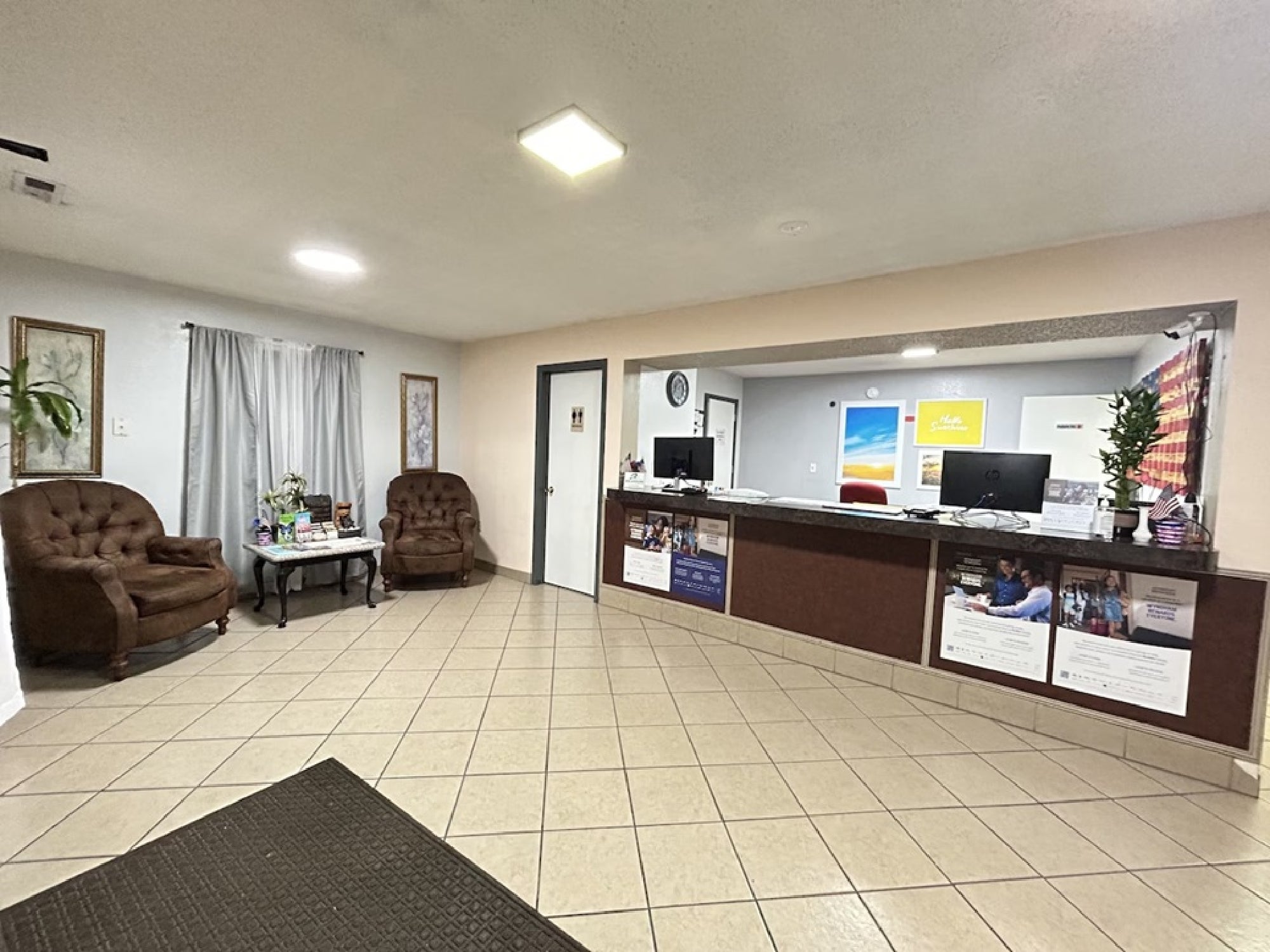 Lobby with lounge area and front desk.