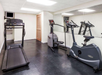 Fitness facility with cardio equipment.