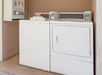 Guest laundry with washer and dryer.