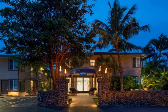 Hotel main entrance at night.
