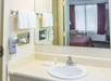 Guest bathroom at Days Inn by Wyndham Valdosta/Near Valdosta Mall.
