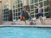 Kids Jumping in the pool.