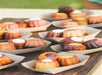 Desserts being prepared to be served to guests for Diamond Head Luau at Waikiki Aquarium, Hawaii.