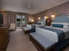 Relax in comfort with two queen beds and a private balcony.