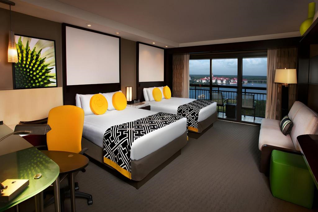 Plenty of space to relax with two queen beds, a day bed, and a balcony with view of the lake.
